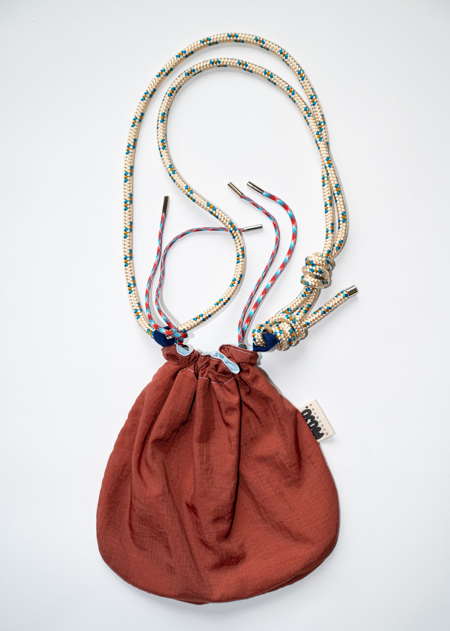 Mojo Bourse (imperméable terracotta & toile de coton bleu ciel)