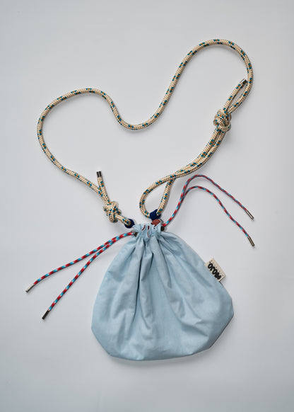 Mojo Bourse (imperméable terracotta & toile de coton bleu ciel)